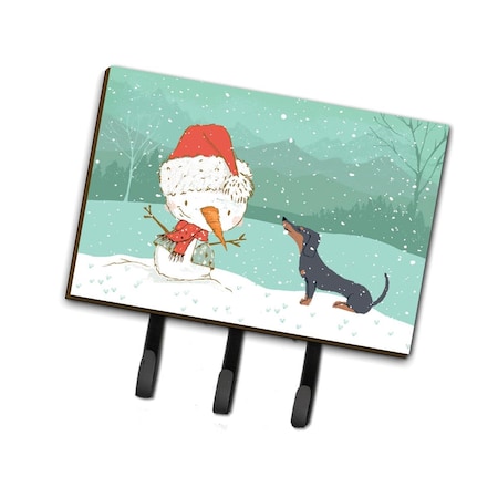 Carolines Treasures Black Tan Dachshund Snowman Christmas Leash or Key Holder CK2083TH68
